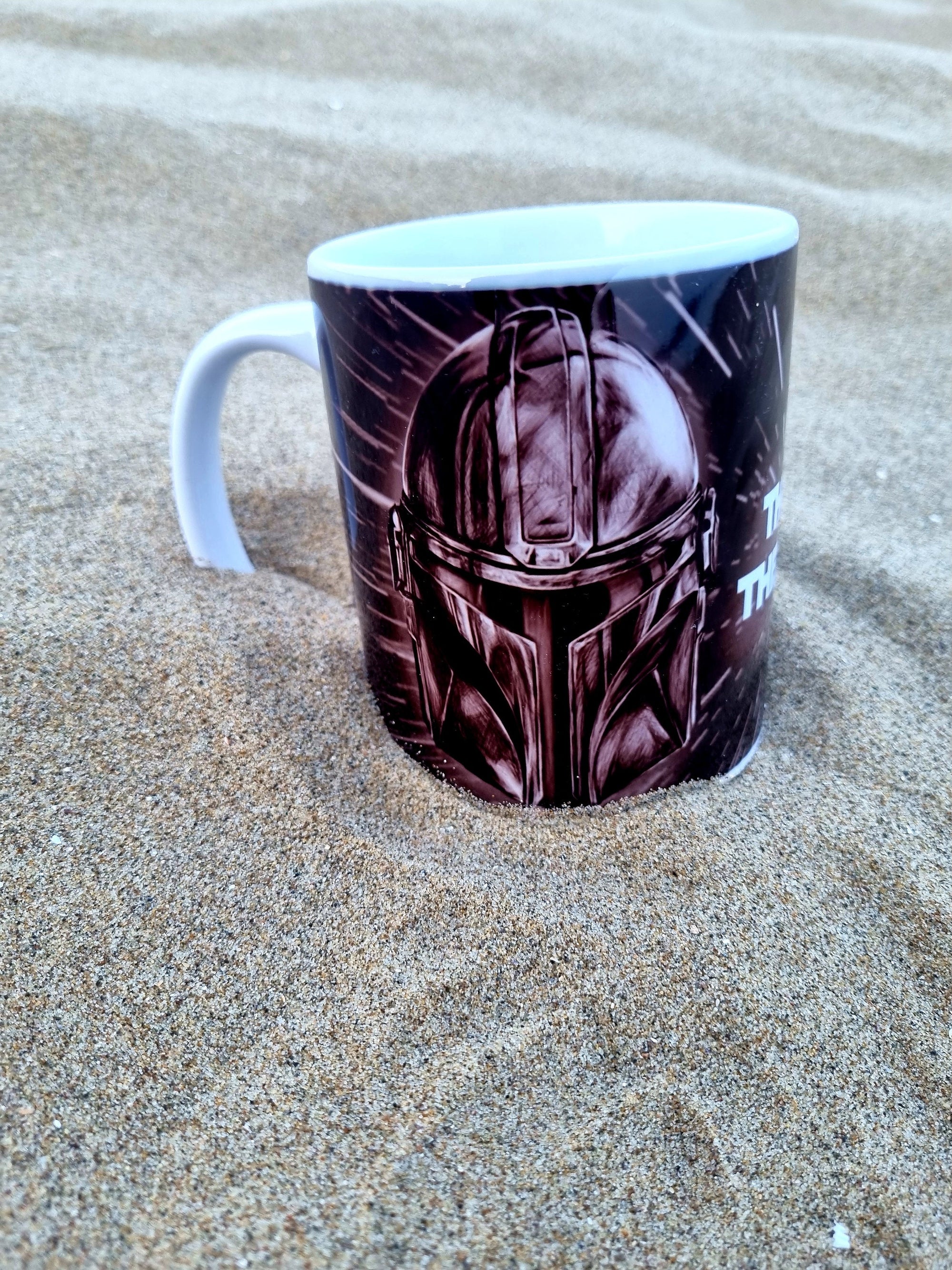 The mandalorian helmet with space background unique illustrated art design handmade, handpressed mug, tea cup. Mug functional art starwars