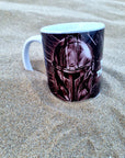 The mandalorian helmet with space background unique illustrated art design handmade, handpressed mug, tea cup. Mug functional art starwars