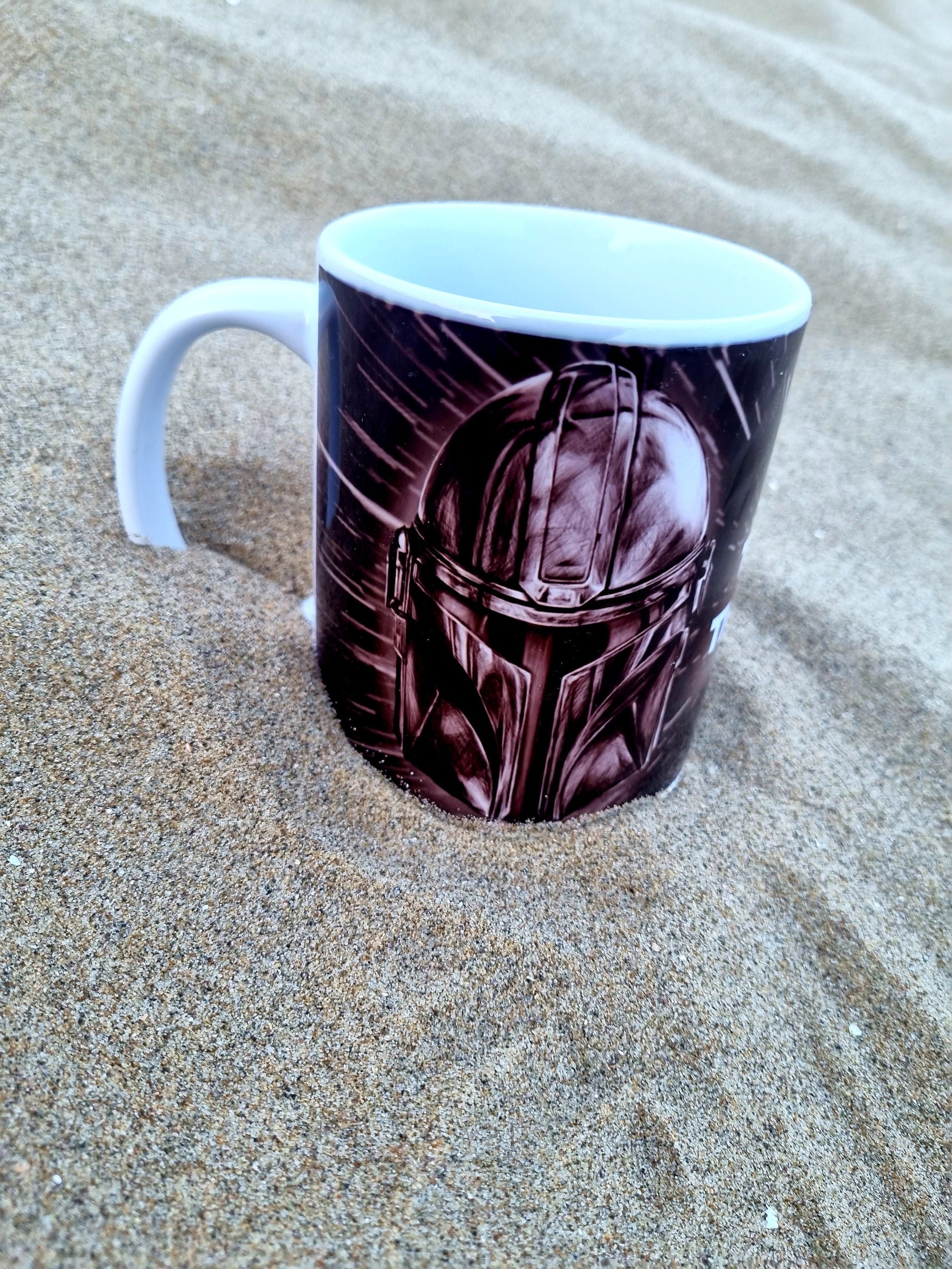 The mandalorian helmet with space background unique illustrated art design handmade, handpressed mug, tea cup. Mug functional art starwars