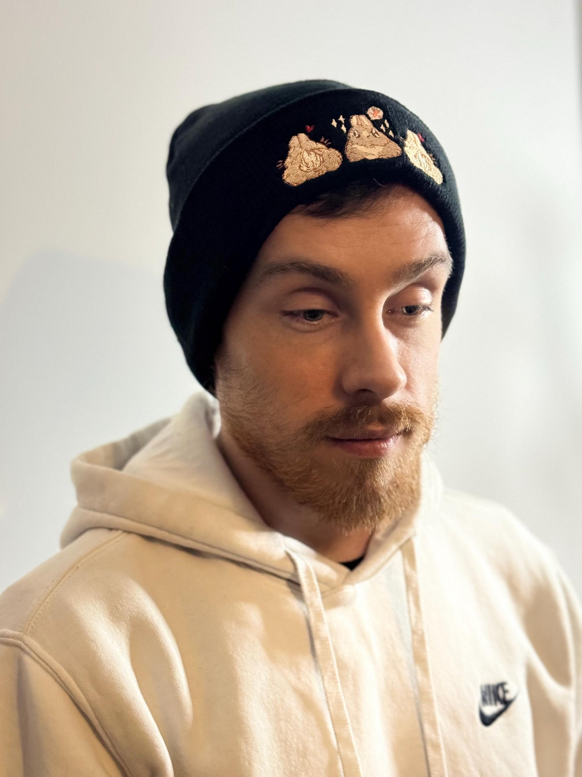 aborable kawaii THE BUNS (c) art rabbit bunny butt cute unique embroidered thermal hat black beanie featuring little hearts and a carrot.