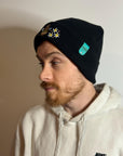 aborable THE BUNS (c) kawaii art rabbit cute spring bee bumble bun embroidered thermal hat black beanie featuring daisies