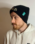 aborable THE BUNS (c) kawaii art rabbit cute spring bee bumble bun embroidered thermal hat black beanie featuring daisies