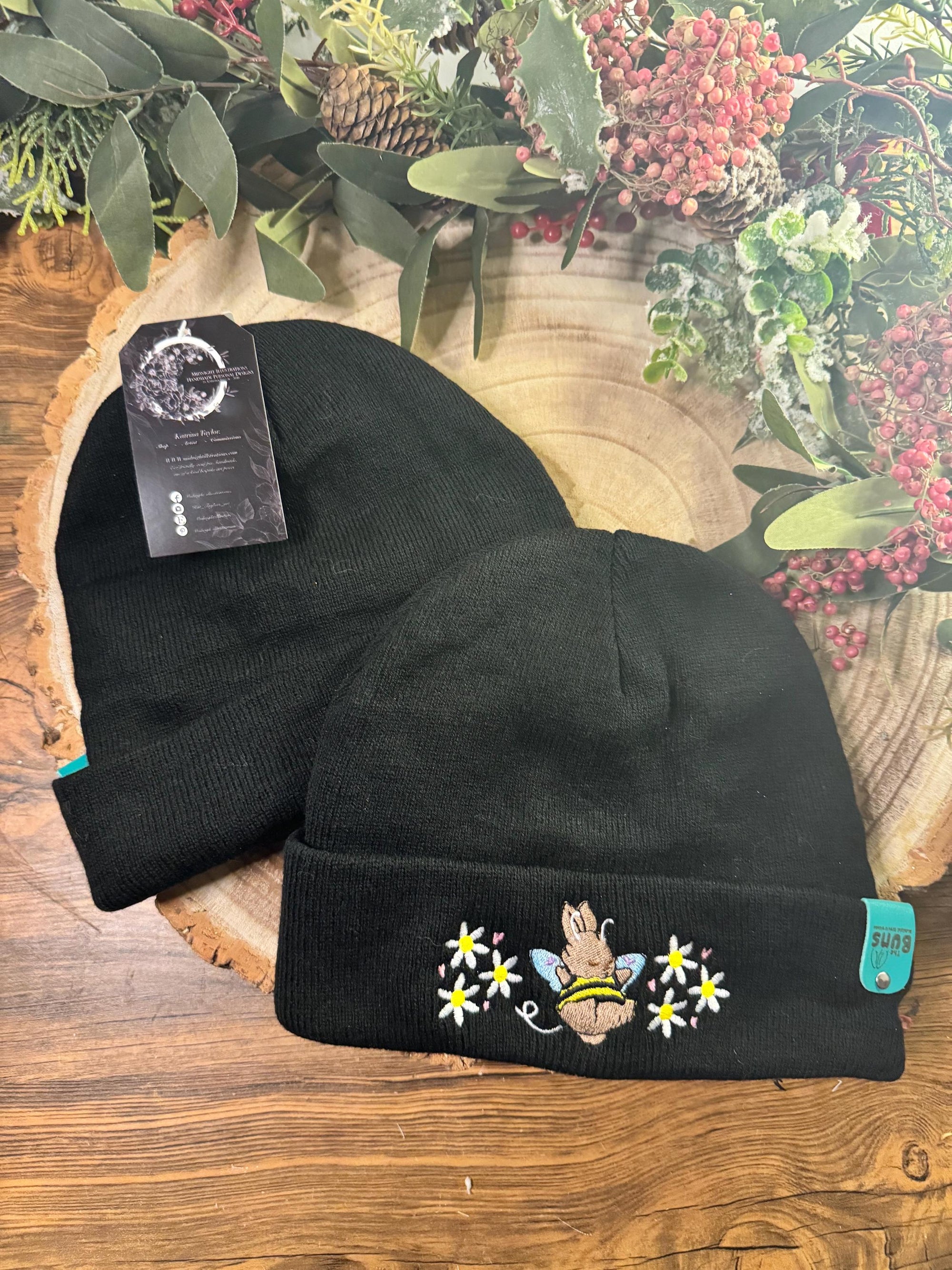 aborable THE BUNS (c) kawaii art rabbit cute spring bee bumble bun embroidered thermal hat black beanie featuring daisies