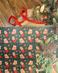 THE BUNS (c) adorable cute Christmas rabbits gift wrap wrapping paper in traditional holiday colours with buns in Santa hats and stockings