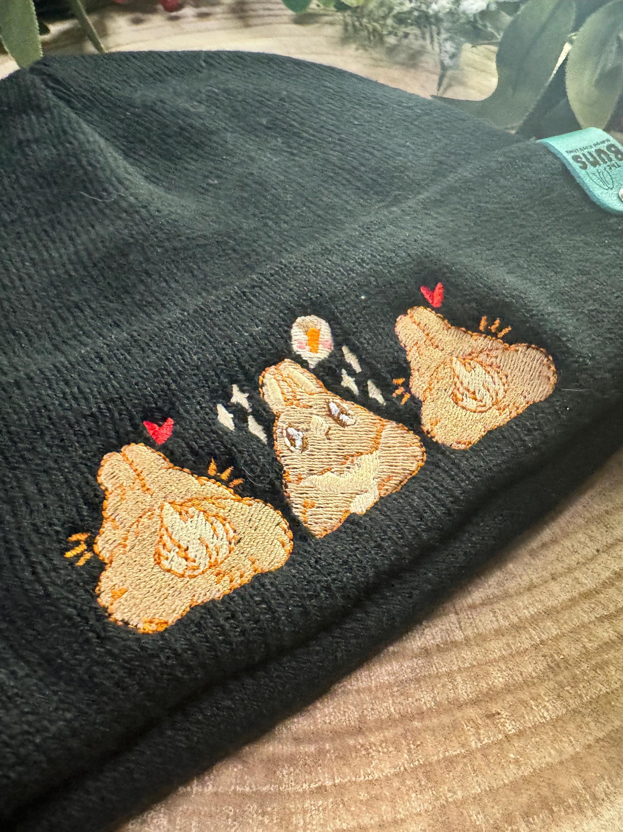 aborable kawaii THE BUNS (c) art rabbit bunny butt cute unique embroidered thermal hat black beanie featuring little hearts and a carrot.