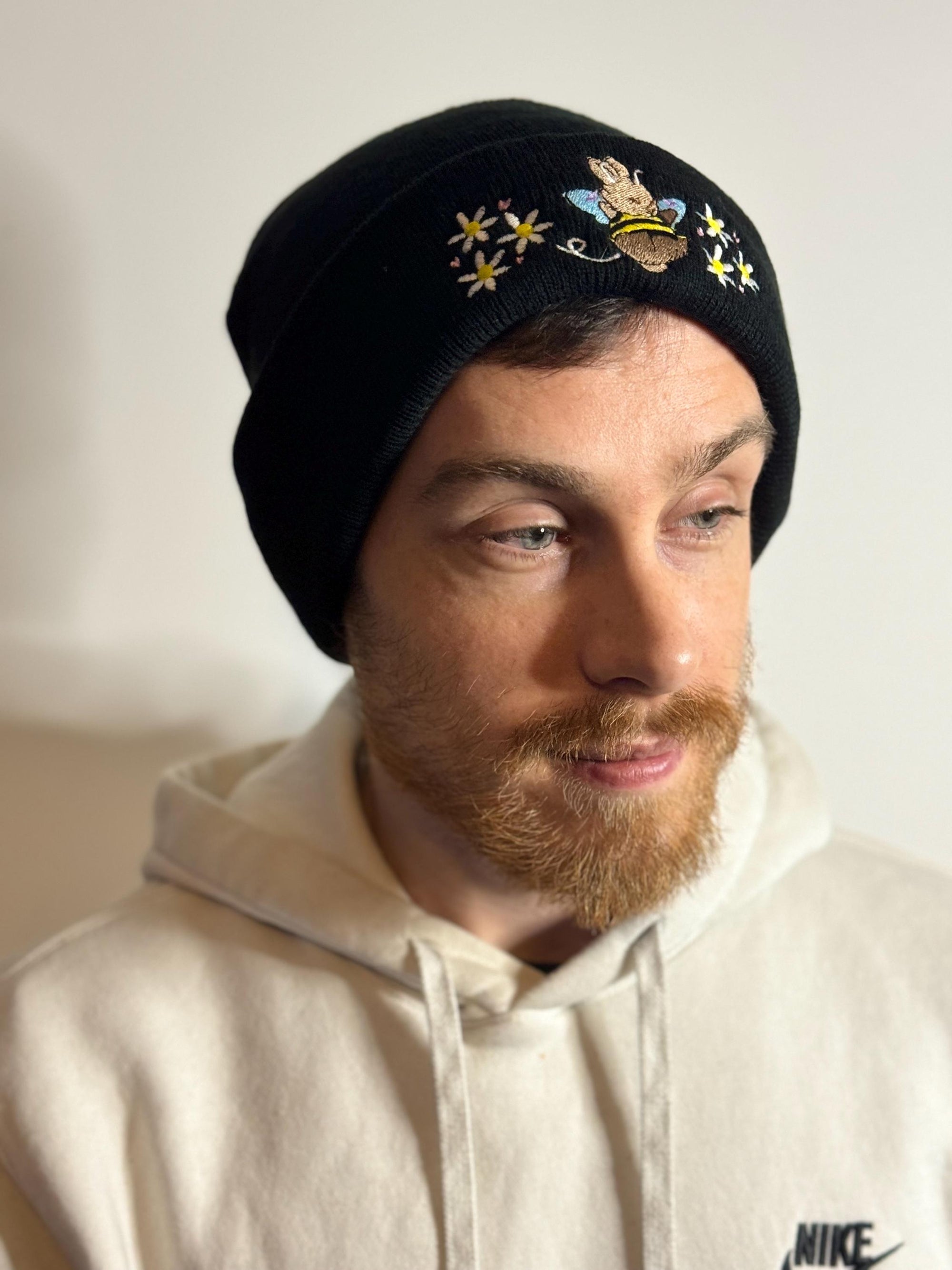 aborable THE BUNS (c) kawaii art rabbit cute spring bee bumble bun embroidered thermal hat black beanie featuring daisies