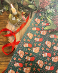 THE BUNS (c) adorable cute Christmas rabbits gift wrap wrapping paper in traditional holiday colours with buns in Santa hats and stockings