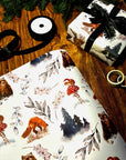 Adorable stylish winter woodlands Christmas gift wrap wrapping paper with mice mushrooms bears and foxes and foliage in cool simplistic blue