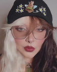 aborable THE BUNS (c) kawaii art rabbit cute spring bee bumble bun embroidered thermal hat black beanie featuring daisies