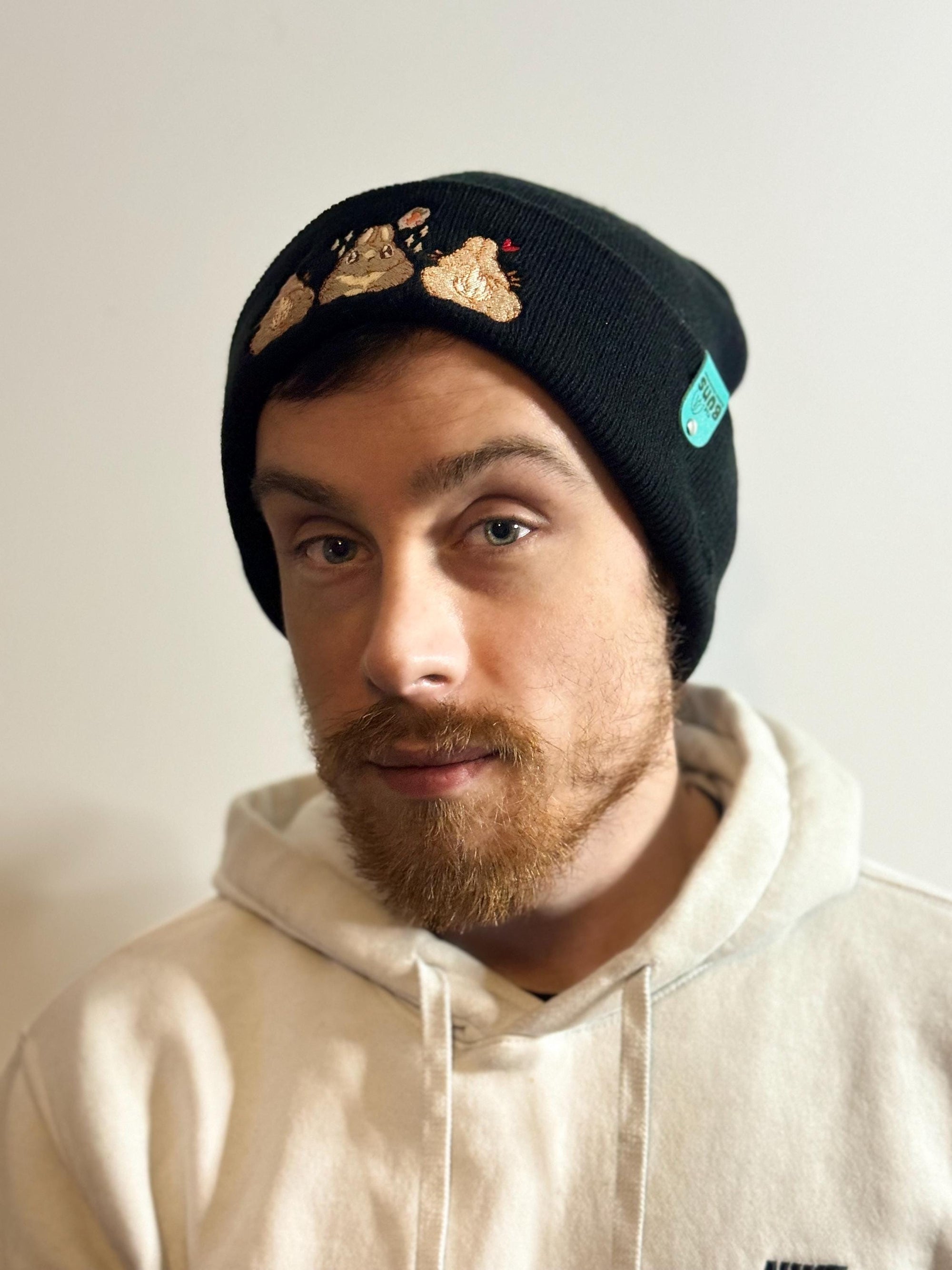 aborable kawaii THE BUNS (c) art rabbit bunny butt cute unique embroidered thermal hat black beanie featuring little hearts and a carrot.