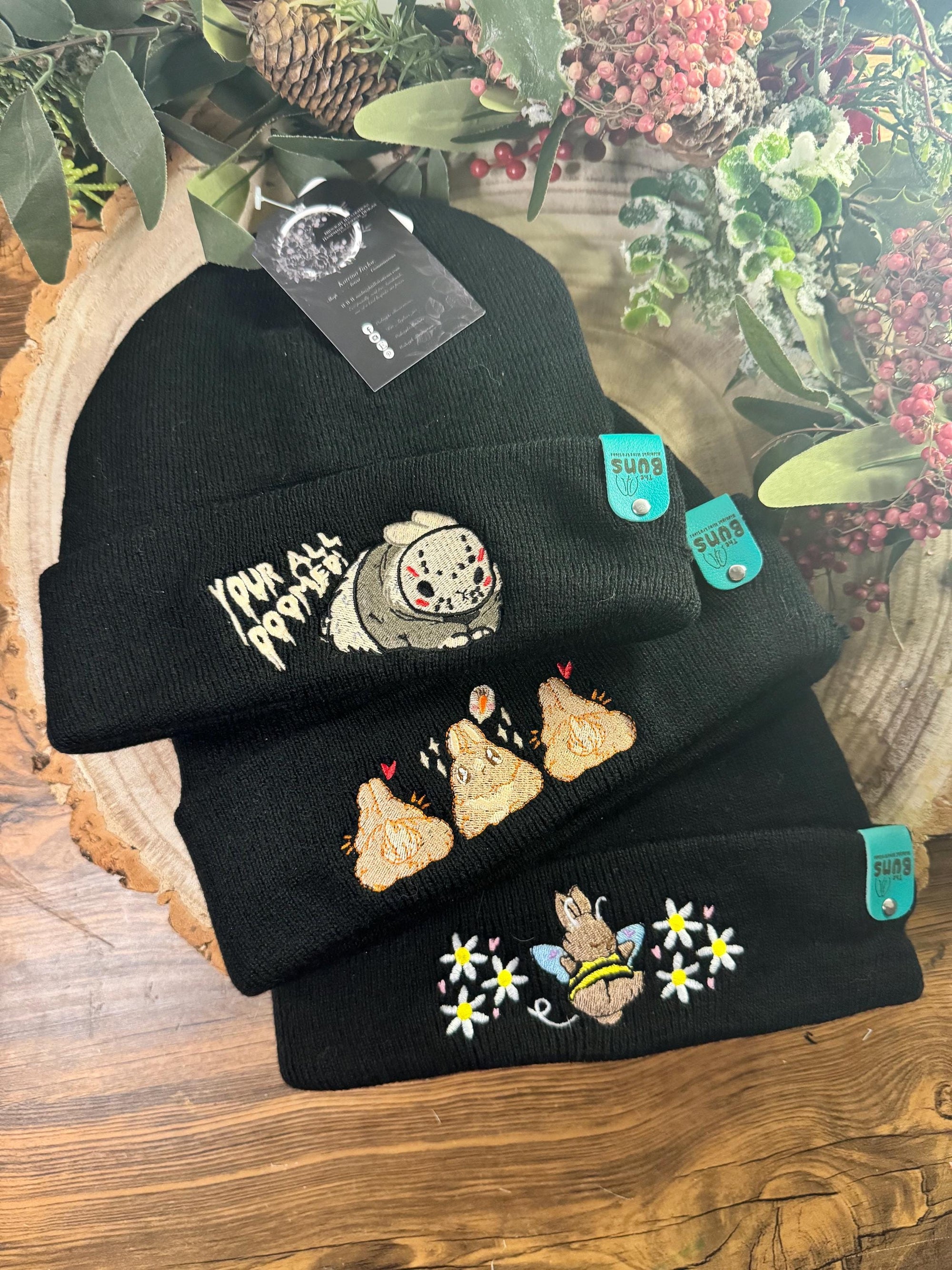 aborable THE BUNS (c) kawaii art rabbit cute spring bee bumble bun embroidered thermal hat black beanie featuring daisies